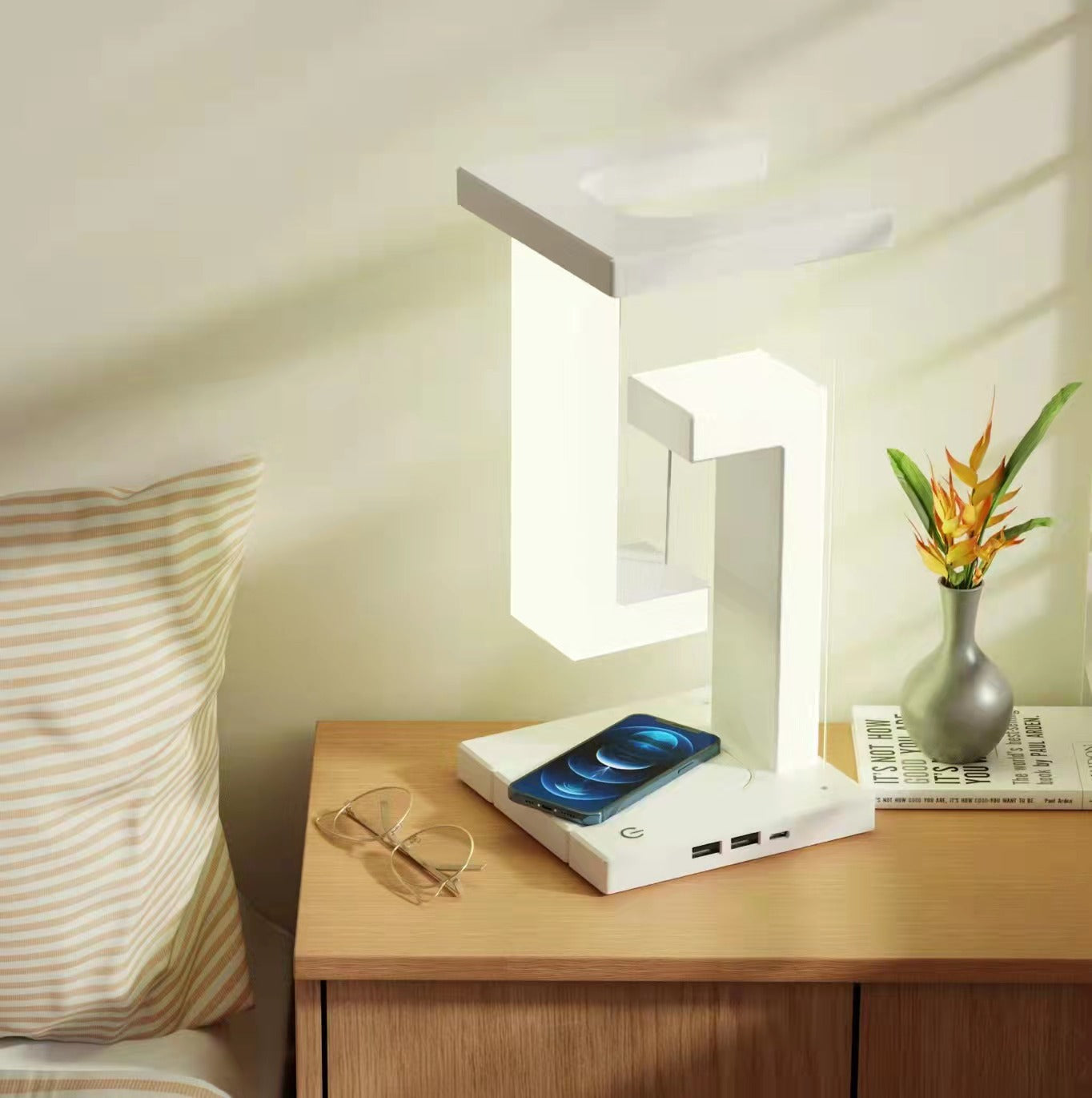 Wireless phone charger and floating table light