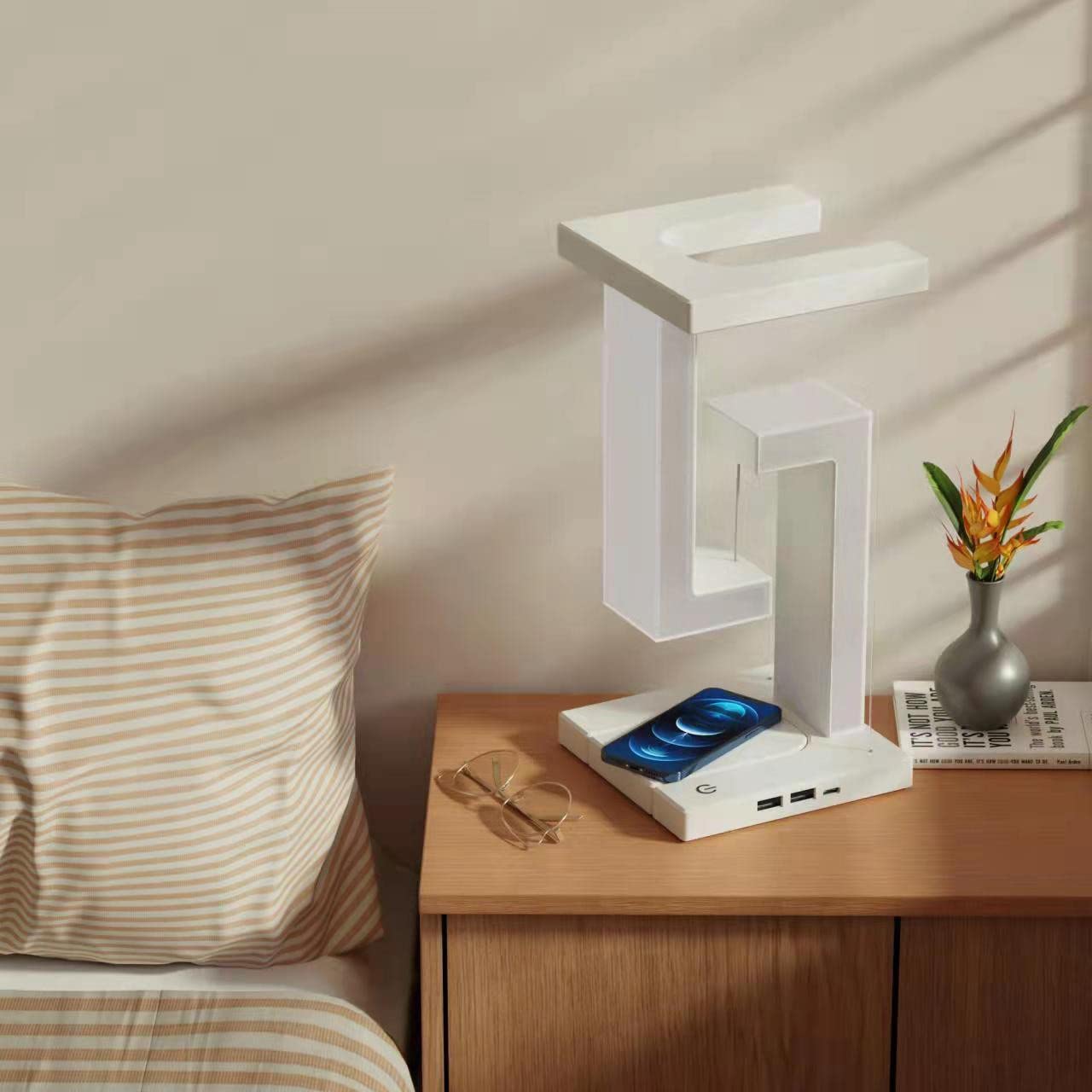 Wireless phone charger and floating table light