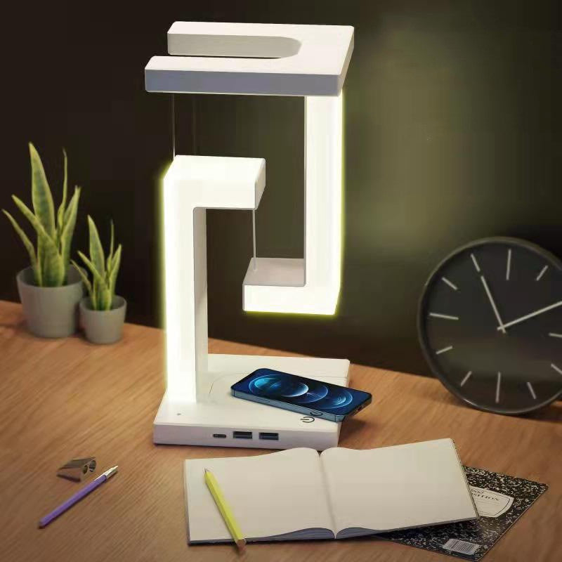 Wireless phone charger and floating table light